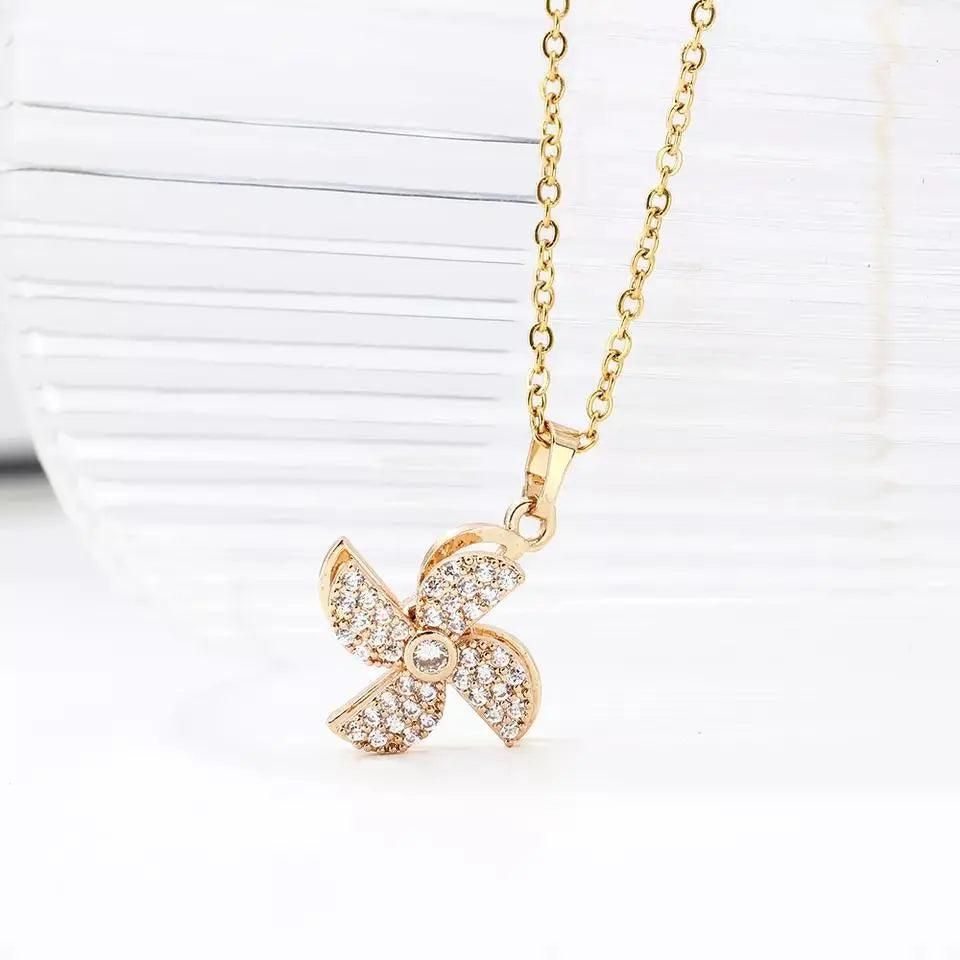 Elegant Flower Pinwheel Rotating Pendant Necklace for Women – Stylish & Unique Design